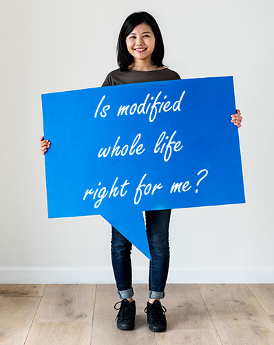 Woman holding a sign that reads, 'Is modified whole life right for me?'