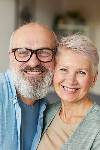 Happy senior couple with universal life insurance.