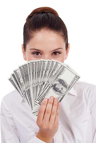 Woman holding a fan of cash representing life insurance cash value