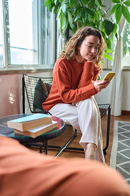 woman-using-cell-phone-to-research-insurance-and-suboxone Young woman using her mobile phone to look up “do insurance companies cover suboxone?”