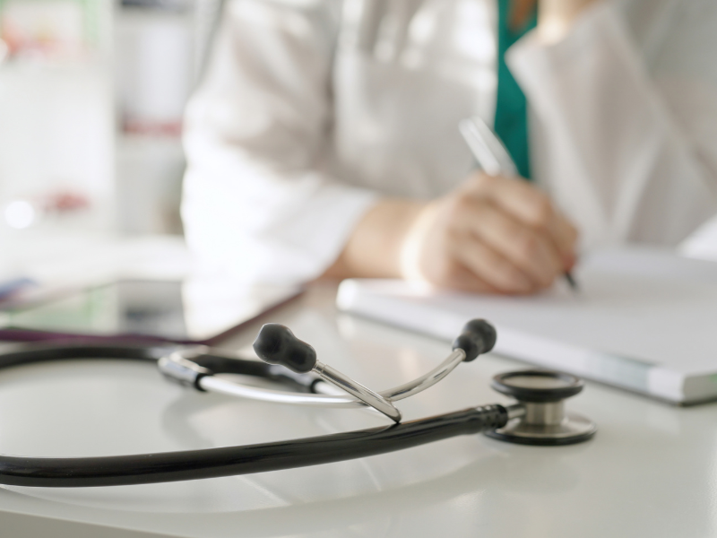 Lifequote Term Life Insurance for Professionals A mother, father, and baby on the couch, wondering how to get life insurance.